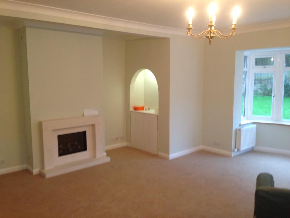 Living room after redecoration — freshly painted, bright and clean